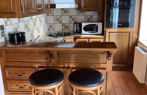 Esterre Ski Chalet | Stone, wood, slate, fireplace, stunning south-facing view, 4 travellers.
