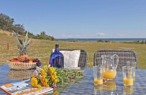 Lobbe Villa | Strandhaus 7 "Ostsee" in Lobbe mit Meerblick, Sauna, Kamin