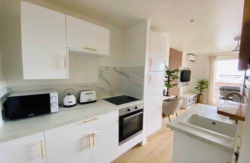 Marigot Apartment | Studio Cocoon, sea and marina view.
