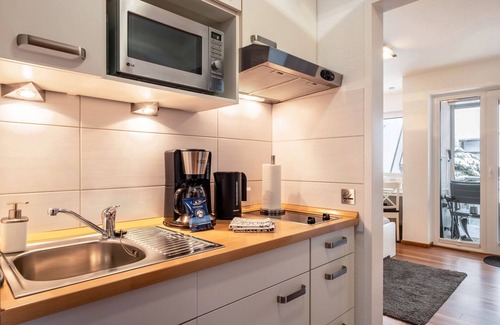 Schoenwald Apartment | Studio 'Schwarzwaldblick F with Pool App 3' with Balcony and Wi-Fi