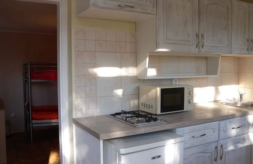 Balatonmariafurdo Apartment | Studio for families with a garden and children's games
