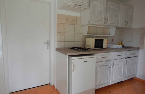 Balatonmariafurdo Apartment | Studio for families with a garden and children's games