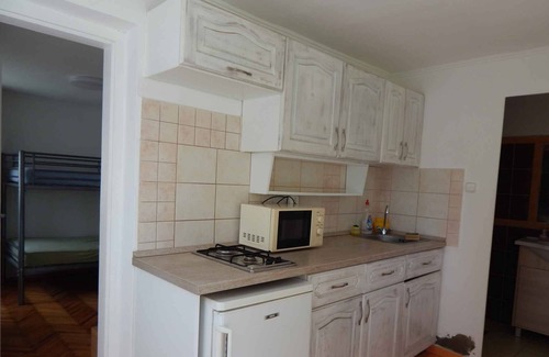 Balatonmariafurdo Apartment | Studio for families with a garden and children's games