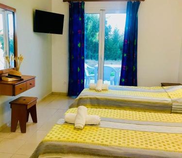Roda Apartment | Studio in Banos Apartments with shared Swimming Pool