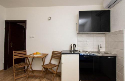 Dobrota Apartment | Studio Lanterna in a seaside house