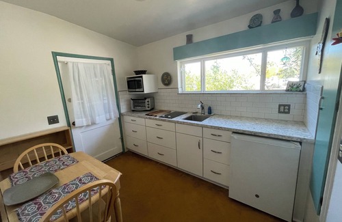 Sam Hughes Apartment | Studio located in historic neighborhood, half mile from U of A.