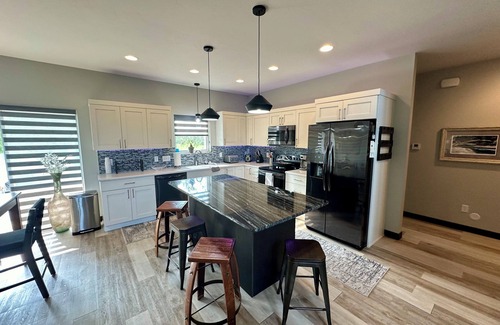 Sioux Falls House | Studio Loft Style Home in Sioux Falls w/Master Suite on main, Hot tub, & Sauna