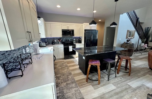 Sioux Falls House | Studio Loft Style Home in Sioux Falls w/Master Suite on main, Hot tub, & Sauna