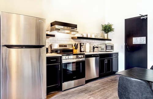 Madison Hotel | Studio queen with views of Lake Monona in the heart of downtown Madison