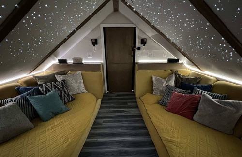 Buechel Apartment | Studio suite with secret movie room! Sleeps 4.