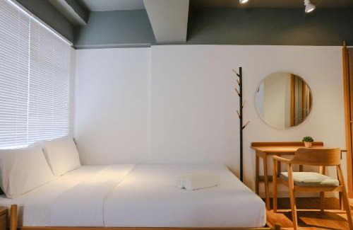Cipaganti Apartment | Studio with Private Living Room at Jarrdin Cihampelas Apartment By Travelio