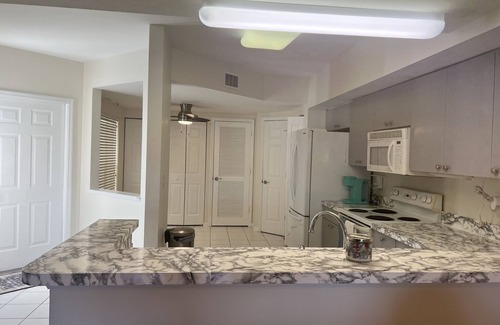 North Naples Condo | Stunning 2/2 Carlton Lakes Condo: Your Naples, FL Paradise Awaits!