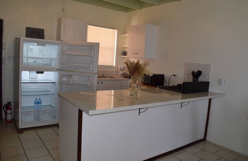 Estate Solberg Apartment | Stunning 2BR Ocean & City View Apt at Sunset Villas -Ideal Location & Amenities!
