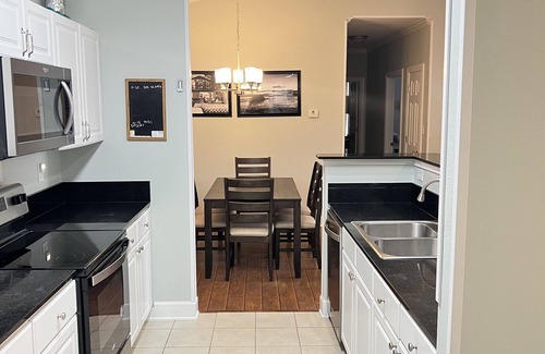 Foley Condo | Stunning 3BR, 2BA luxury retreat with pool view, just 7 miles from the beach!