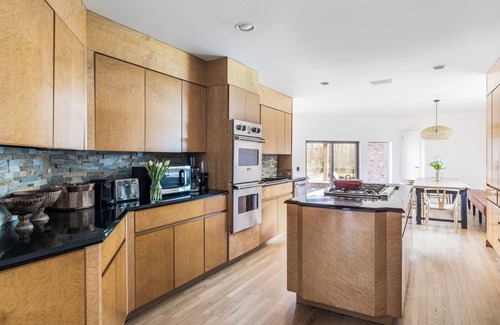 Hampton Bays House | Stunning 6,000 sq ft home on 1.28 private acres in Hamptons Bays, with pool.