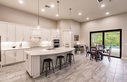 Arborwood House | Stunning home with heated saltwater pool & Cypress Preserve views!