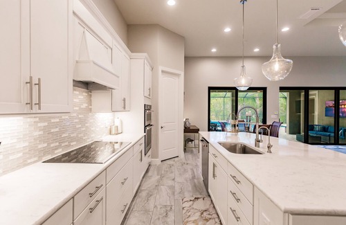 Arborwood House | Stunning home with heated saltwater pool & Cypress Preserve views!