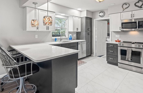 Gibsonton House | Stunning Inside and Out - Remodeled 3BR Riverfront Home with Hot Tub, Kayaks and Access to the Gulf