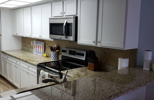 Sunset Reef Condo | Stunning Ocean Front Condo (Two King Beds) with Cottage Charm