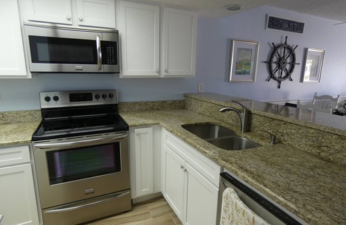 Sunset Reef Condo | Stunning Ocean Front Condo (Two King Beds) with Cottage Charm