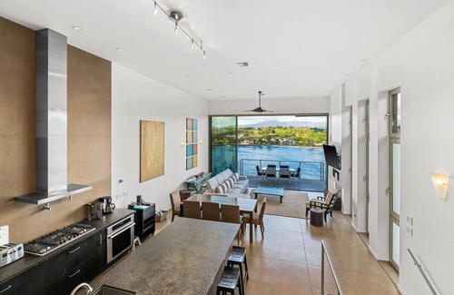 Lihue Apartment | Stunning Oceanfront Penthouse, 14' ft Ceilings and Wall-to-Wall Glass Slider.