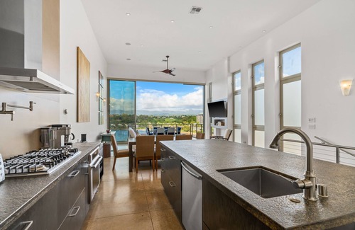 Lihue Apartment | Stunning Oceanfront Penthouse, 14' ft Ceilings and Wall-to-Wall Glass Slider.