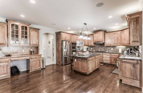 Overland Park House | Stunning private villa pond, theater, a place for loving memories
