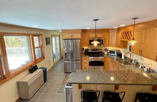 Raymond House | Stunning Private Waterfront Lodge on Crystal Clear Crescent Lake
