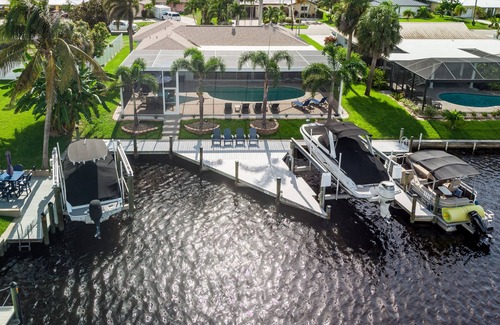 Yacht Club House | Stunning Remodel, HEATED POOL, Brand New Furnishings, Full Canal Sunset View