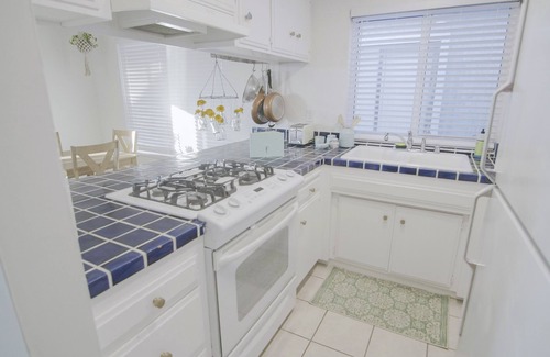 Newport Shores House | Stylish and Bright unit across the street from the beach at half the cost!
