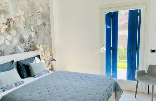 Santa Maria in Stelle Apartment | Stylish apartment with a garden on the beach