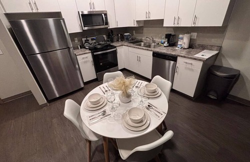 Downtown Des Moines Apartment | Stylish Black-themed Apartment in Des Moines