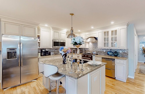 Westbrook Condo | Stylish condo with a high-end kitchen, washer/dryer, & large yard