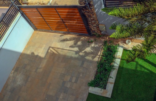 Madina Apartment | Stylish, furnished 4-bedroom house. 25 minutes drive from the airport