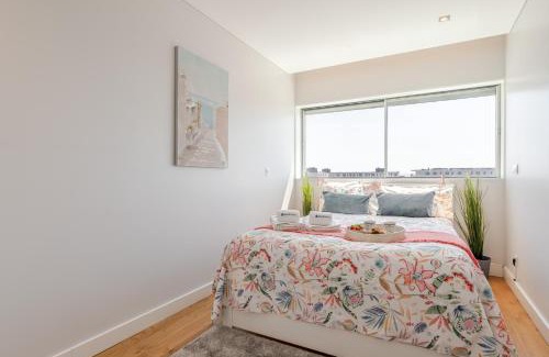 Campanha Apartment | Stylish Home with Balcony & Garage by HostWise