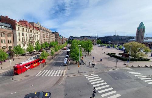 Kluuvi Apartment | Stylish home with stunning views of the railway square 74m2