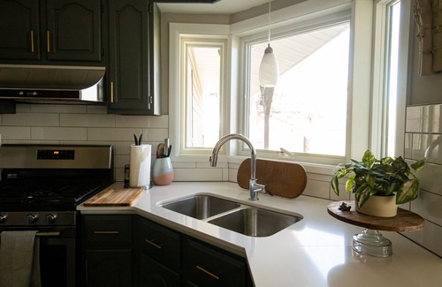Bettendorf House | Stylish Mid-Century home on Mississippi River bike path.