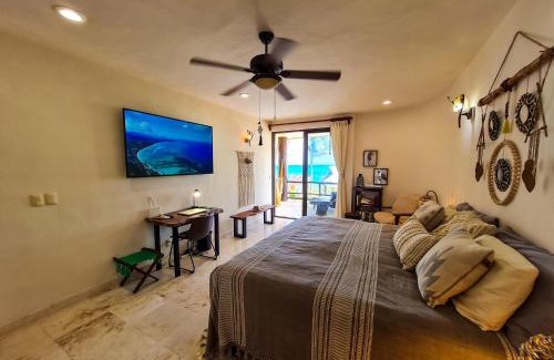 Majahual Apartment | STYLISH OCEANFRONT CONDO with POOL