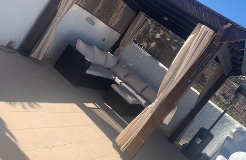 La Parata Villa | Stylish villa with heated pool. 7 minute walk to beach, bars and restaurants!