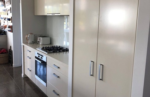 Gold Coast House | Stylish Waterfront Escape: The Shed on South Stradbroke Island