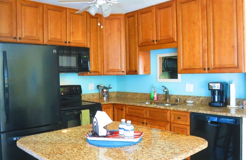 Cocoa Beach Condo | SUBTROPICAL OASIS CONDO, HEATED POOL, STEPS TO THE OCEAN, GREAT LOCATION