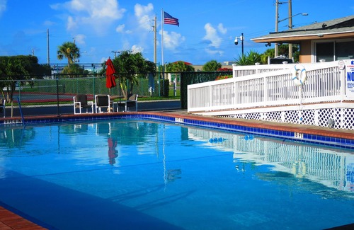 Cocoa Beach Condo | SUBTROPICAL OASIS CONDO, HEATED POOL, STEPS TO THE OCEAN, GREAT LOCATION