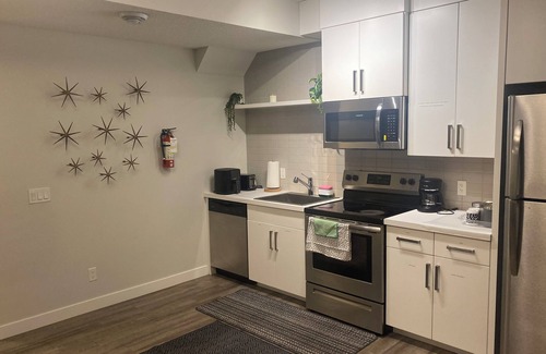 Calgary House | Suite close to the airport in Calgary with dedicated concrete pad for parking
