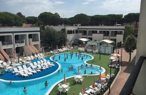 Lido di Spina Apartment | SUITE SUITABLE FOR FAMILIES, pool view, 500 M FROM THE SEA