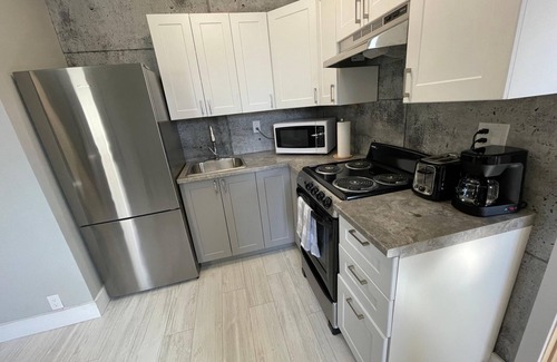 Rouyn-Noranda Apartment | Suite with closed bedroom and sofa bed near Plage Kiwanis (Le Convivial)