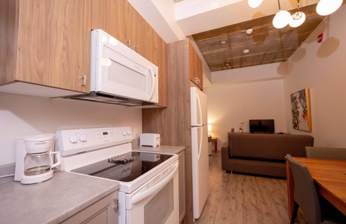Rouyn-Noranda Apartment | Suite with closed bedroom and sofa bed on rue Gamble Ouest (Le Central)
