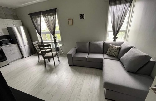 Rouyn-Noranda Apartment | Suite with closed bedroom (Le Convivial)