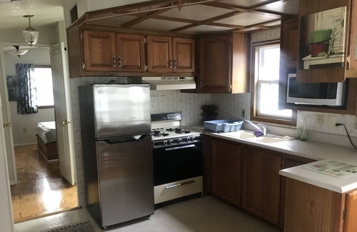 Pefferlaw RV Rental | Summer getaway near Lake Simcoe. Golf course across the street with a restaurant