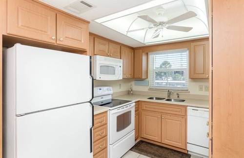 Avon By The Sea Condo | Sun-Kissed Escape: Steps to Pier w/Heated Pool & Private Balcony