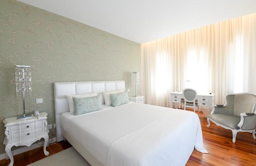 Sandim House | Sundial Gardens & Suites